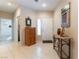 Inviting entryway with neutral tones, tile flooring, and decorative accents at 3215 Stratford Hall Ct, Las Vegas, NV 89135