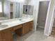 Bathroom featuring double vanity sinks and a separate toilet room at 331 Mount Hope St, Henderson, NV 89014