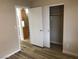 Bedroom featuring an open sliding door closet with hard wood flooring at 331 Mount Hope St, Henderson, NV 89014