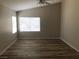 Spacious main bedroom with hardwood flooring and large windows at 331 Mount Hope St, Henderson, NV 89014