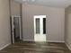 Open main bedroom features hardwood floors and views of ensuite bath and closet at 331 Mount Hope St, Henderson, NV 89014