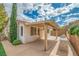 This home features a large back patio with a custom outdoor kitchen and a covered seating area at 3441 Mountain Park St, Las Vegas, NV 89129