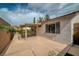 This home's back patio features custom outdoor kitchen, patio cover, and well-maintained landscaping at 3441 Mountain Park St, Las Vegas, NV 89129