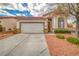 Charming single-story home with a two-car garage and a well-maintained front yard landscape at 3441 Mountain Park St, Las Vegas, NV 89129