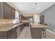 Modern kitchen featuring granite countertops, stainless steel appliances, and tile flooring at 3441 Mountain Park St, Las Vegas, NV 89129