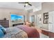 Bright bedroom with scenic window view, comfortable furniture, and decor at 3536 Golden Pedal St, Las Vegas, NV 89129