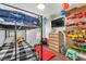 bedroom with bunk beds, a pegboard wall and closet at 3536 Golden Pedal St, Las Vegas, NV 89129