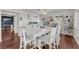 Open dining area with hardwood floors, stylish decor, and abundant natural light at 3536 Golden Pedal St, Las Vegas, NV 89129