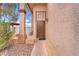 Inviting entryway with a secure front door, brick accents, and a well-maintained landscape at 3536 Golden Pedal St, Las Vegas, NV 89129