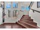 Stylish wood staircase with large windows offering lots of natural light at 3536 Golden Pedal St, Las Vegas, NV 89129