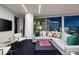 Cozy living room area with large sectional couch, city views, and plush carpeting at 3726 S Las Vegas Blvd # 1107, Las Vegas, NV 89158