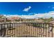 Scenic view of the backyard from the balcony with well-maintained landscaping and neighborhood homes at 3789 Gershon Ct, Las Vegas, NV 89121