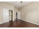 Spacious bedroom features hardwood floors, closet, and an attached area with laundry hookups at 3789 Gershon Ct, Las Vegas, NV 89121