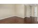 Unfurnished bedroom featuring hardwood floors, neutral paint, and a bright, airy atmosphere at 3789 Gershon Ct, Las Vegas, NV 89121