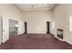 Spacious bedroom with high ceilings, fireplace and multiple entry points to other areas of the home at 3789 Gershon Ct, Las Vegas, NV 89121