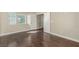 Bedroom featuring hardwood floors and a doorway leading to other rooms at 3789 Gershon Ct, Las Vegas, NV 89121