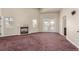 Spacious bedroom featuring fireplace and balcony access at 3789 Gershon Ct, Las Vegas, NV 89121