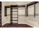 Walk-in closet with custom shelving and hanging rods at 3789 Gershon Ct, Las Vegas, NV 89121