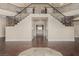 Elegant foyer with grand staircase and beautiful tile work, creating a welcoming entrance at 3789 Gershon Ct, Las Vegas, NV 89121
