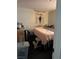 Comfortable bedroom featuring a cozy double bed and a spacious closet at 3934 Torsby Pl, Las Vegas, NV 89119