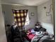 Bedroom providing a serene and restful space, though cluttered at 3934 Torsby Pl, Las Vegas, NV 89119