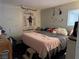 Cozy bedroom with relaxed decor, featuring a comfortable bed and soft lighting at 3934 Torsby Pl, Las Vegas, NV 89119