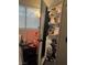 Bedroom closet with plentiful storage and clothing rods. Adjacent to bedside table at 3934 Torsby Pl, Las Vegas, NV 89119