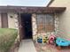 Home exterior with stone accents, featuring a secure gated entry for added privacy at 3934 Torsby Pl, Las Vegas, NV 89119