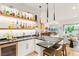 Stylish bar area with a sleek countertop, ample shelving, and beverage cooler at 4078 San Franchesca Ct, Las Vegas, NV 89141