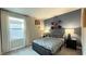 bedroom featuring sports decor, a comfortable bed, and plenty of natural light at 4181 Nopal Serrano Ave, Las Vegas, NV 89141