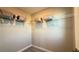 Walk-in closet with ample shelving for organized storage in a clean and tidy space at 4181 Nopal Serrano Ave, Las Vegas, NV 89141