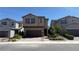 Charming two-story home featuring a two-car garage, desert landscaping, and a welcoming front entryway at 4181 Nopal Serrano Ave, Las Vegas, NV 89141