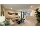 Spacious living room featuring contemporary decor, plush seating, and a bright, airy atmosphere at 4181 Nopal Serrano Ave, Las Vegas, NV 89141