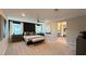 Expansive main bedroom featuring modern decor, ample natural light, and a luxurious atmosphere at 4181 Nopal Serrano Ave, Las Vegas, NV 89141