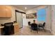 Contemporary home office with a sliding glass door, modern desk, and stylish decor at 4181 Nopal Serrano Ave, Las Vegas, NV 89141
