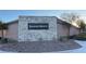 Community signage at Saguaro Ranch with decorative stone and landscaping at 4181 Nopal Serrano Ave, Las Vegas, NV 89141