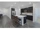 Kitchen with eat-in island, modern appliances, and ample cabinet space at 4315 E Cactus Canyon Dr, Pahrump, NV 89061