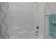 Modern shower featuring clean tile, and useful shelving space at 4315 E Cactus Canyon Dr, Pahrump, NV 89061