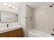 Updated bathroom with stylish vanity, modern fixtures, and new tile in shower at 4921 E Washington Ave, Las Vegas, NV 89110