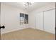 Bright bedroom featuring modern lighting and large wardrobe at 4921 E Washington Ave, Las Vegas, NV 89110
