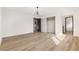 Spacious bedroom with wood-look floors and closet at 4921 E Washington Ave, Las Vegas, NV 89110