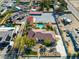 Aerial view of the property, highlighting the pool, gardens, and ample parking space at 5340 N Campbell Rd, Las Vegas, NV 89149