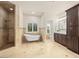 Elegant bathroom features a clawfoot tub, walk-in shower, and dual vanity at 5340 N Campbell Rd, Las Vegas, NV 89149