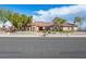 Charming single-story home with lush landscaping and well-maintained surroundings at 5340 N Campbell Rd, Las Vegas, NV 89149