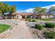 Attractive single-story home with desert landscaping and a stone walkway at 5340 N Campbell Rd, Las Vegas, NV 89149