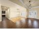 Welcoming home foyer featuring hardwood floors, natural light and a modern light fixture at 5340 N Campbell Rd, Las Vegas, NV 89149
