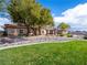 Lush front lawn with mature trees and attractive landscaping at 5340 N Campbell Rd, Las Vegas, NV 89149