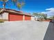 Spacious three-car garage and long driveway, offering plenty of parking and storage options at 5340 N Campbell Rd, Las Vegas, NV 89149