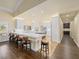 Spacious kitchen with white cabinets, large island, and stainless steel appliances at 5340 N Campbell Rd, Las Vegas, NV 89149