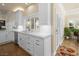 Bright kitchen features ample counter space, plantation shutters, and stainless steel appliances at 5340 N Campbell Rd, Las Vegas, NV 89149